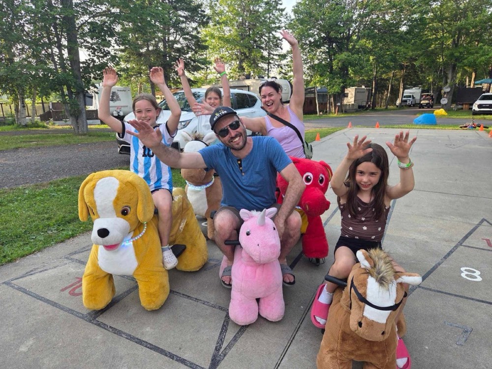 Family with ride-on animals