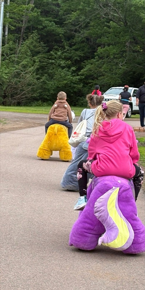 Kids riding at an outdoor event